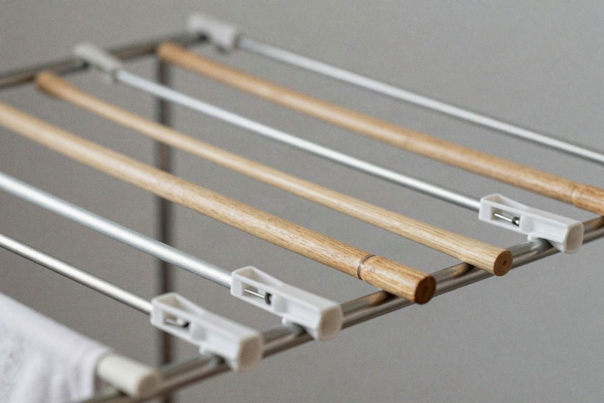 Illustrative image: detail of various folded clothesline models closed.