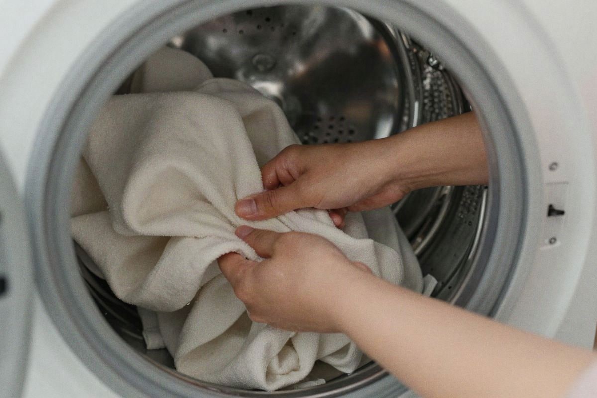Illustrative image: fabric curtain washing and maintenance process