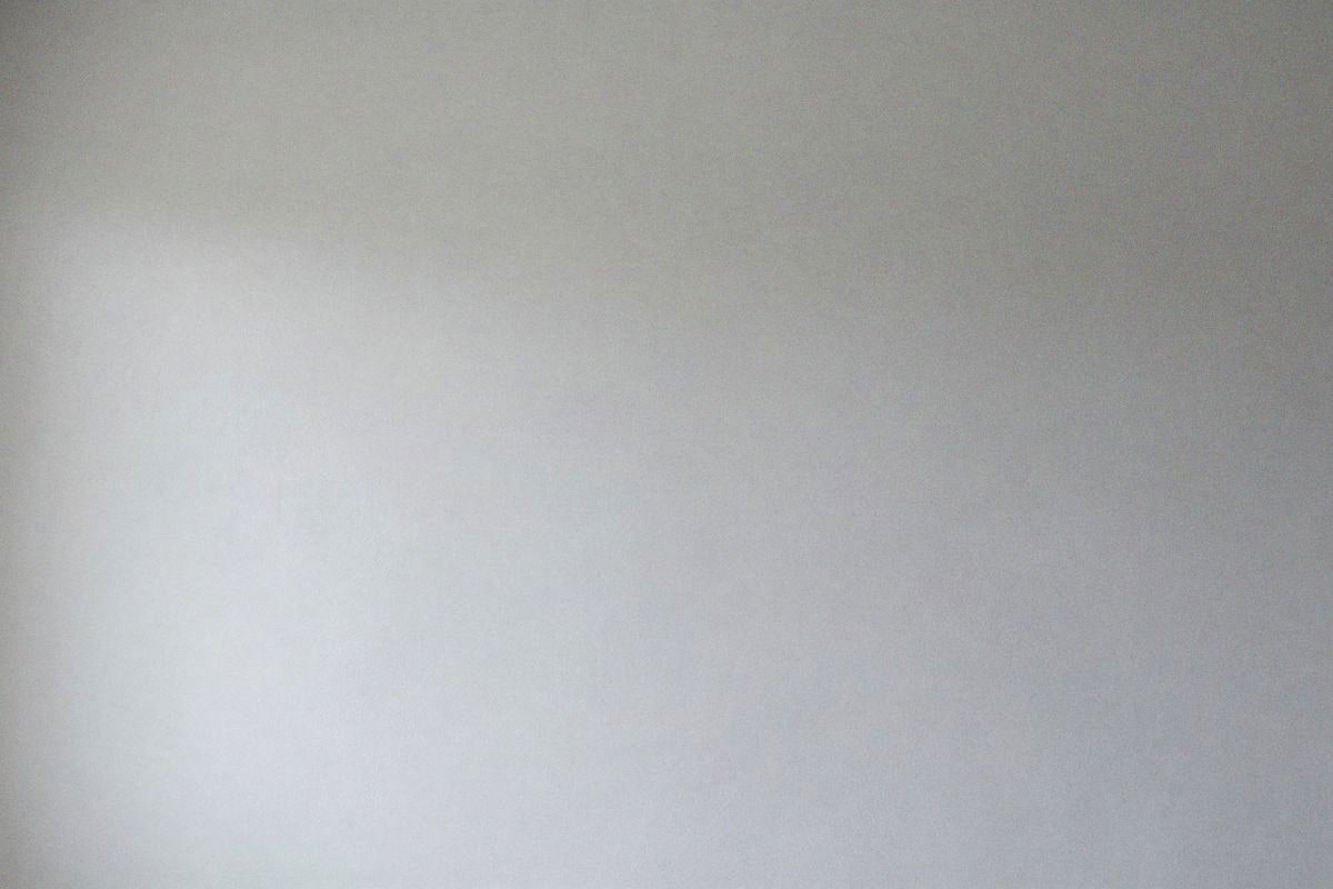 Illustrative image: finished wall with cement effect paint, perfect finish after drying.
